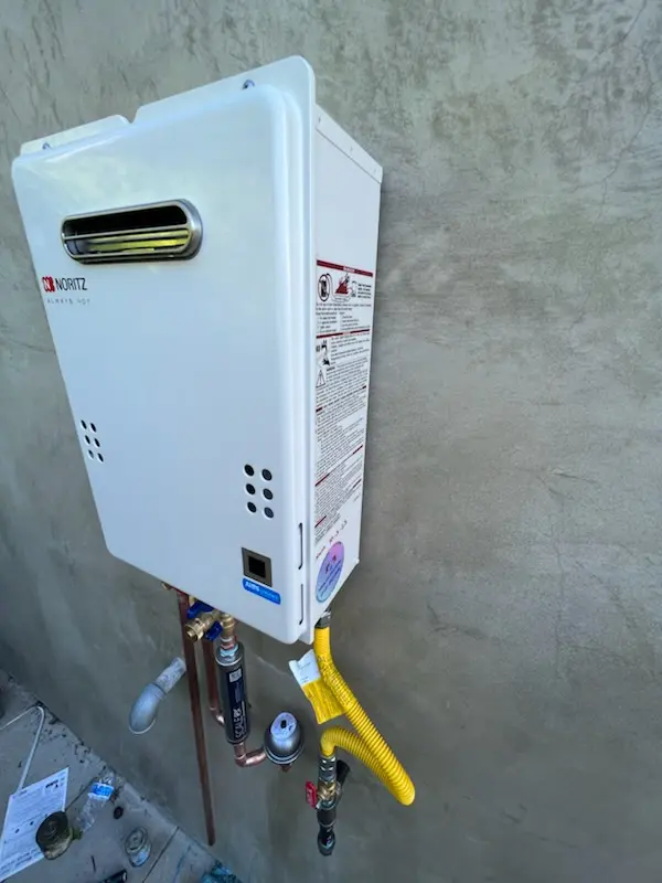 Tankless water heater installation for Lower Village homes